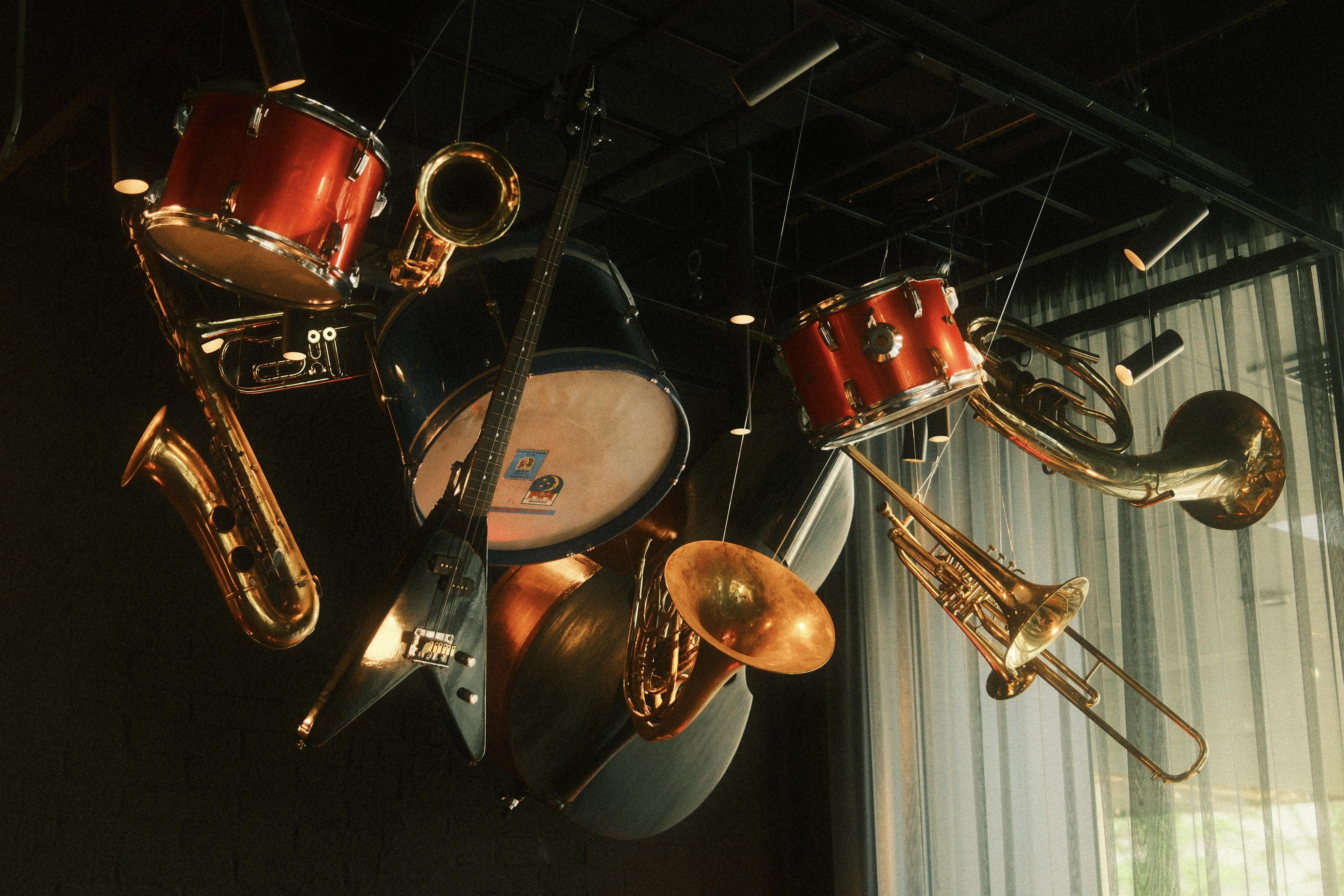 Instruments suspended in warm light